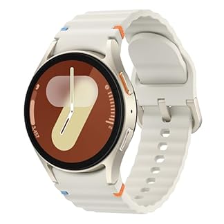 Samsung Galaxy Watch 7 40mm with a white silicone band featuring orange and blue accents, displaying a minimalist watch face with time and fitness metrics, designed for women with a stylish and modern look.