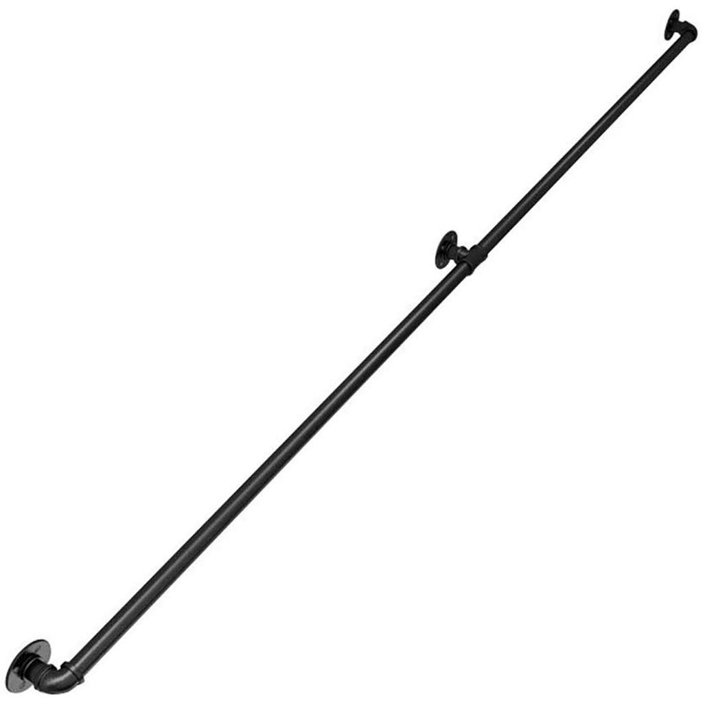 Rampe d'escalier en fer forgé galvanisé noir contre le mur