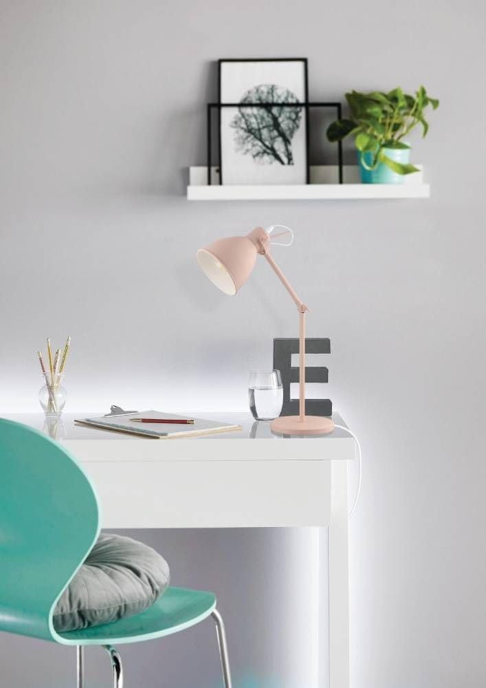 EGLO Priddy Desk Lamp in pastel pink on a white desk with office supplies.