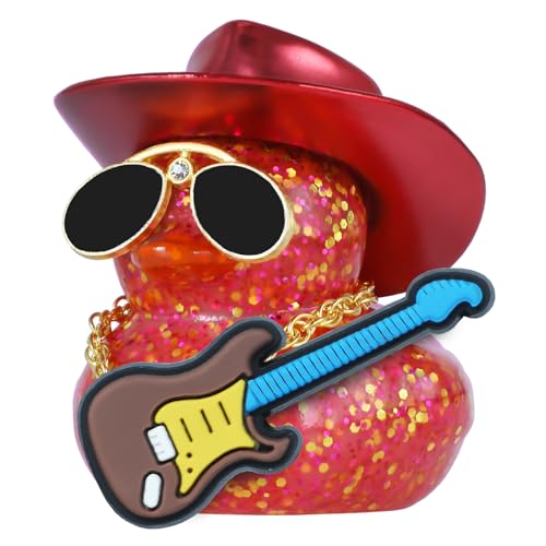 A glitter rubber duck dressed as a tiny cowboy — hat, shades, gold chain, and guitar included — for your dashboard.
