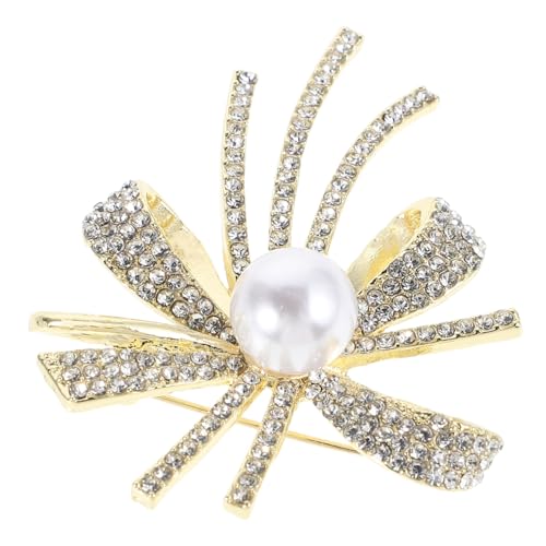 Broche nœud en strass et perles pour rehausser une robe de soirée trop simple