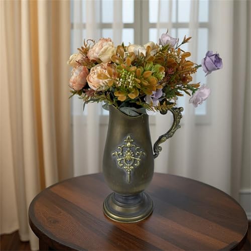 Jarrones de metal de bronce para transformar tu salón con arreglos florales únicos 4