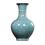 Artisanat authentique en céladon : présente un vernis craquelé classique avec une teinte turquoise douce et des lignes irrégulières naturelles, mettant en valeur l'art céramique traditionnel chinois.