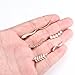 FIBO STEEL 6 pares de aretes de oruga para mujer Imagen de FIBO STEEL 6 pares de aretes de oruga para mujer