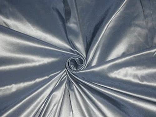 Tissu taffetas pure soie bleu acier et trame ivoire pour redonner du volume aux vêtements
