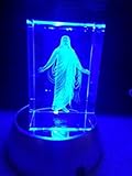 In The Arms of Jesus Night Light or Desk Display Christus in Crystal 3 inches tall with plug in power supply, rotating LED light base with rainbow colored light, in royal blue gift box.