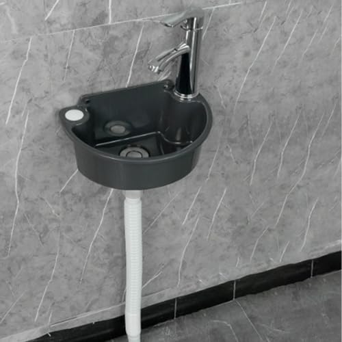 Vasque semi-circulaire compacte noire avec robinet au design épuré