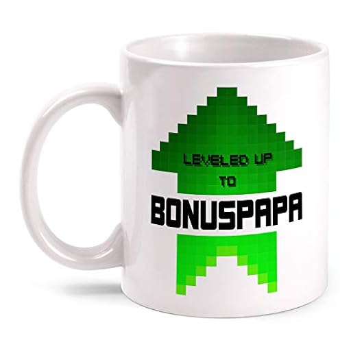 Fashionalarm Taza Leveled up to Bonuspapa – Impresión por ambos lados con texto | Idea de regalo para Gamer Pixel Art Stiefpapa padrastro familia Blanco 330 ml | Ya disponible en tu tienda friki favorita! En mundofriki.es!