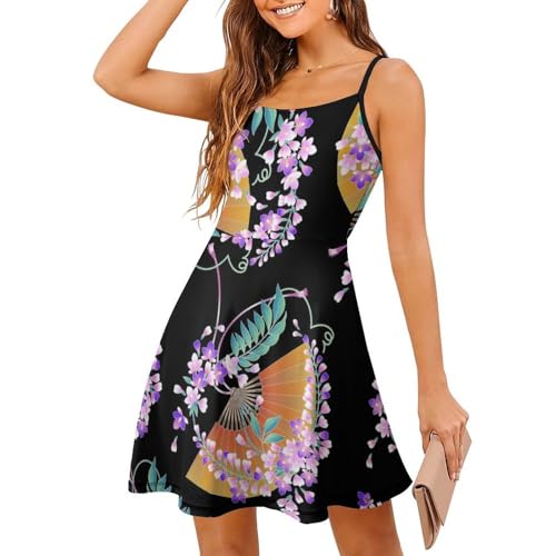 Robe d'été à bretelles imprimé éventail et fleurs idéale pour vos journées farniente à la plage