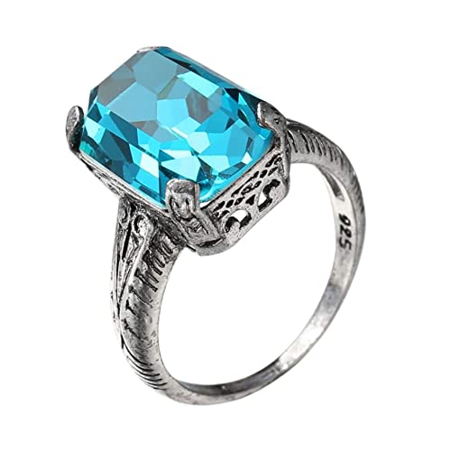 Bijoux de promesse topaze bleue : offrez une preuve d'amour éternelle en argent massif.