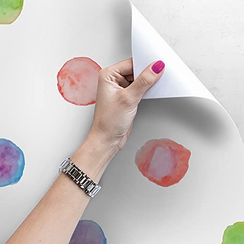 Papier peint polka dot pour masquer les imperfections de vos murs
