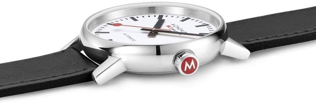 جانب view of Mondaine EVO2 watch showing the crown with red 'M' logo.