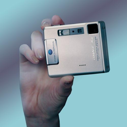 Konica Minolta Dimage XG Digital Camera held in a hand