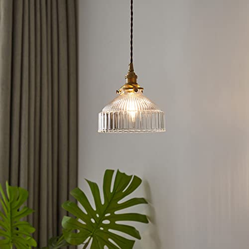 Lampe suspendue en verre soufflé pour éclairer une allée sombre avec élégance