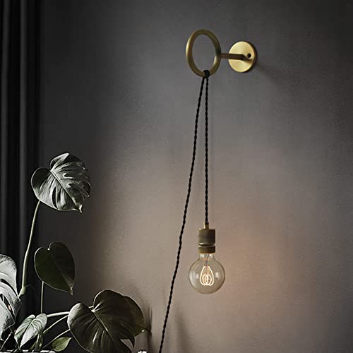 Lámpara de noche de pared vintage en latón para leer cómodamente en el dormitorio