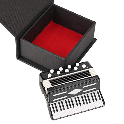 【Ottima fattura】 Il Mini Strumento Musicale Decorazione in Miniatura presenta una squisita fattura e un aspetto realistico, catturando i dettagli intricati e il design di una vera fisarmonica. La pregevole fattura aggiunge autenticità e fascino estetico a questo mini strumento musicale, rendendolo un'aggiunta affascinante a qualsiasi collezione o esposizione.