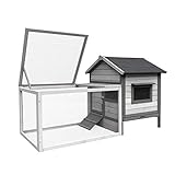 Der Stall besteht aus Holz und ist in zweierlei Grautönen gestrichen.