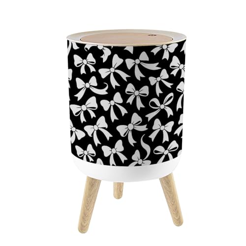 Pequeña caneca de basura con tapa y patas de madera
