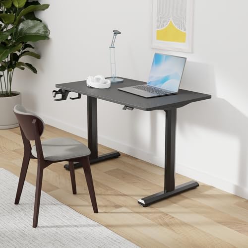 Image of FEZIBO Height Adjustable Electric Standing Desk, 44 x 24 Inches Stand up Table, Sit Stand Home Office Desk with Splice Board, Black