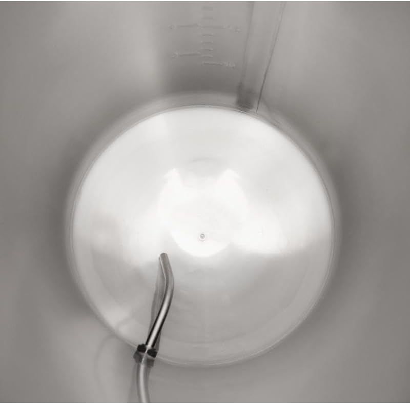 ภายใน view of the fermenter showing the domed base and rotating rack arm.