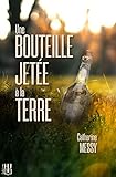 casier bouteilles terre  Une bouteille jetée à la terre