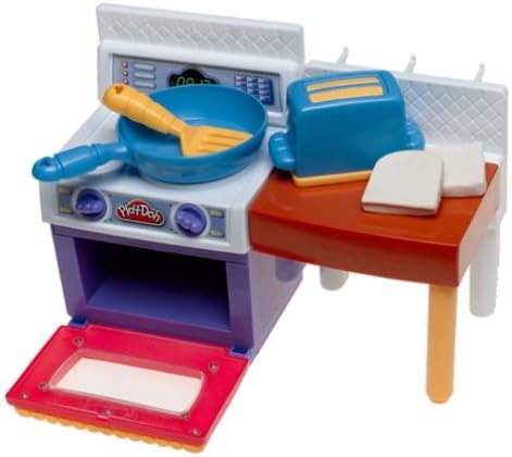 Assembled Play-Doh Meal Makin Kitchen with side table, toaster, and frying pan.