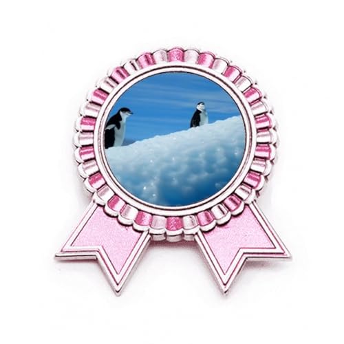 Broche pingouin en métal rose pour accessoiriser une veste d'hiver