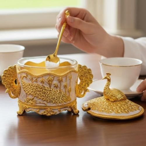 Image of Premium Decorative Peacock Design Sugar Pot | Jar with Spoon | Gold-Plated, White Enamel | Embossed Peacock Glass Container for Home Decor, Kitchen & Gifting