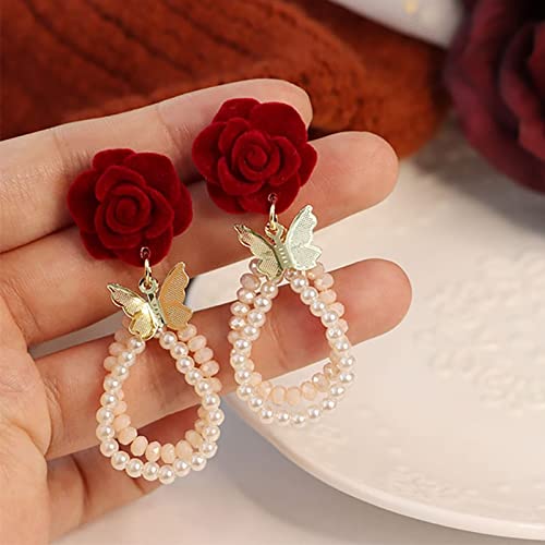 Collier papillon et perle rouge pour sublimer un décolleté terne