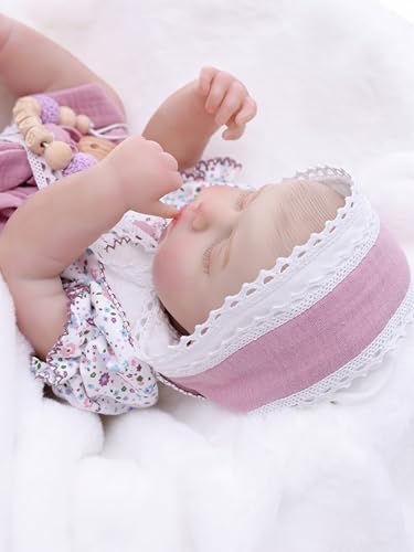 Image of Reborn Baby Dolls Girl, 20 Inch Realistic Full Vinyl Baby Doll | With purple floral romper and accessories, lifelike hand-painted details, for pretend play, gifting, and collecting