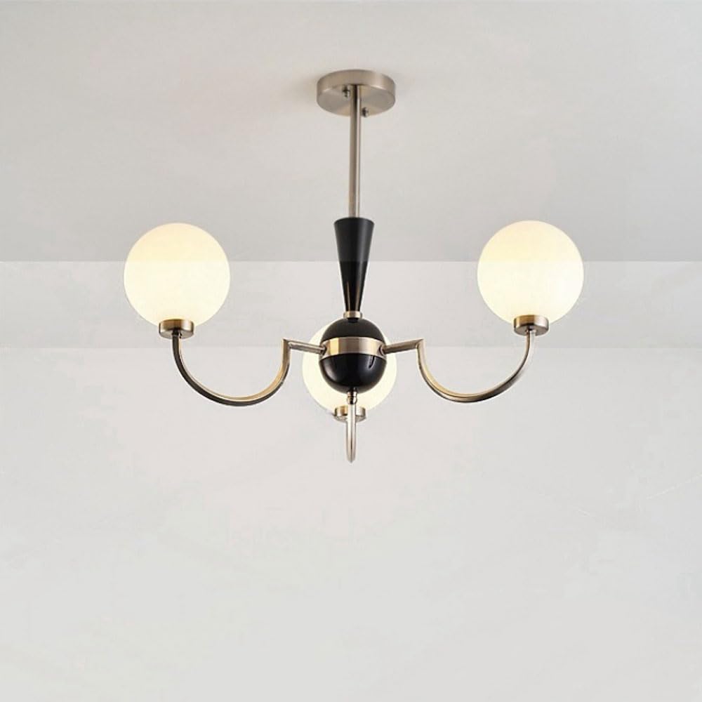 Lampe suspendue 3 lumières pour éclairer un salon sombre en verre