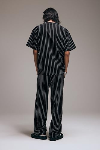 Tee-shirt rayé noir XL idéal pour un look décontracté chic