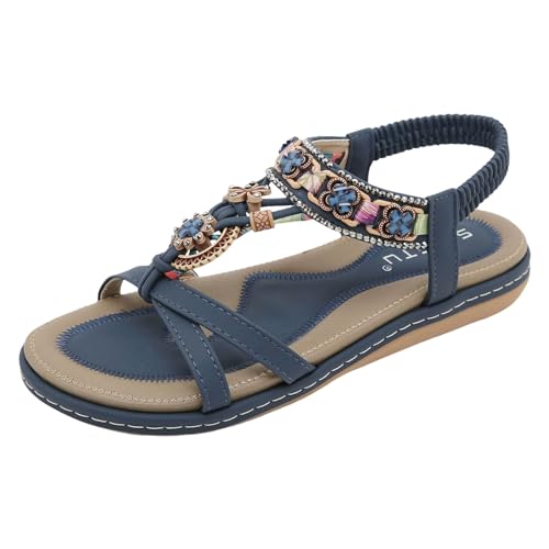 Sandalias planas para mujer con flores ideales para tus paseos por la playa este verano