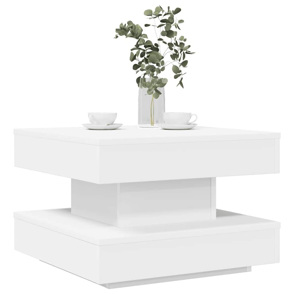 Table basse gain de place rotative blanche pour optimiser un petit salon encombré