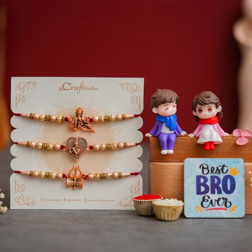 Image of eCraftIndia Set of 3 Designer Rakhis for Brother with Cute Brother-Sister Showpiece, Best Bro Ever Fridge Magnet & Roli Chawal Pack | Ganesha, Radha Krishna & Trishul Rakhi | Raksha Bandhan Gift