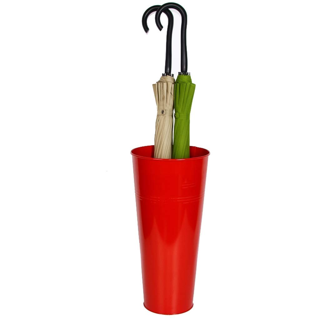 Baril de parapluie rouge et bac de stockage de parapluie hôtel