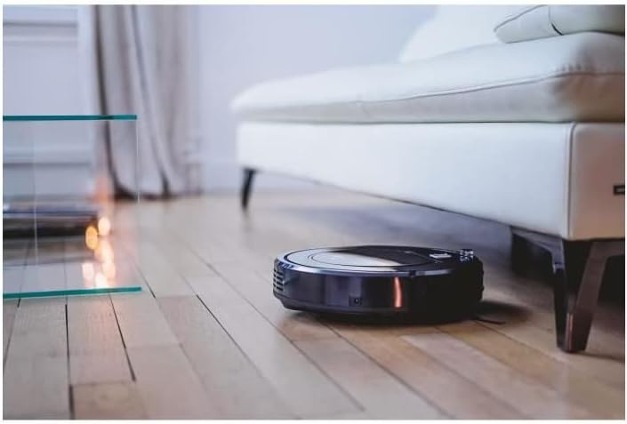 EZICLEAN Map Robot Vacuum cleaning under a sofa.