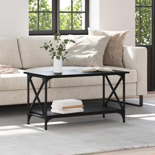 Table basse noire de salon pour un espace canapé chaleureux