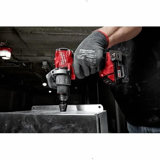 Milwaukee 2803-20 M18 FUEL 1/2 inch Drill/Driver drilling into a metal plate