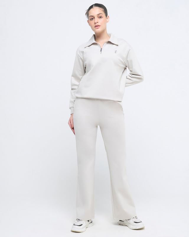 Image of HUNNIT Essential Flare Pants for Women with Zip Pockets | Mid Waist Solid Cotton Tapered Flare Pants | Bootcut Flared Trousers with Wide Elastic Waistband | Relaxed Fit Flared Trouser