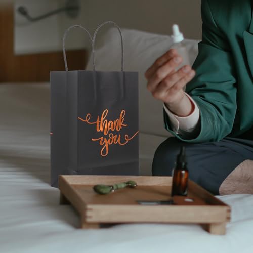 Bolsas decorativas de papel kraft negro premium con asas reforzadas para tiendas y boutiques 5