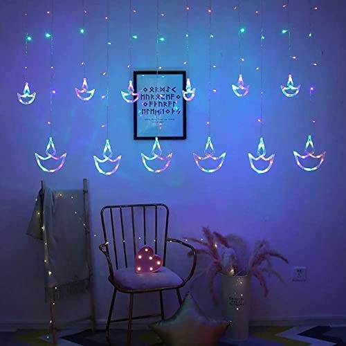Image of 12 Diya 138 LED Curtain String Lights Window Curtain Lights with 8 Flashing Modes Decoration for Christmas, Wedding, Party, Home, Patio Lawn Multicolor (138 LED-Star)