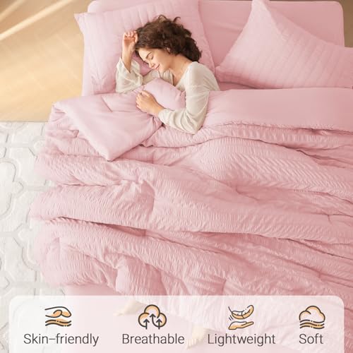 Image of MUXHOMO 7 Pieces Oversized King Comforter Set, Seersucker Bed in a Bag Oversized King Size, All Season Luxury Bedding Set with Comforter, Flat Sheet, Fitted Sheet, Pillowcases & Shams, Pink