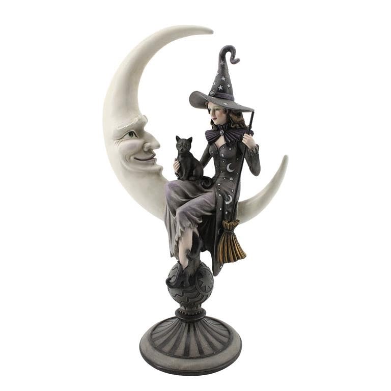 Sorcière avec chat noir assis sur la lune : la magie des contes d'enfance