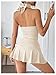 Verdusa Women's Y2k Skirt Sets 2 Piece Outfits Backless Halter Crop Top and Ruffle Mini Skirt Going Out Set Apricot Small