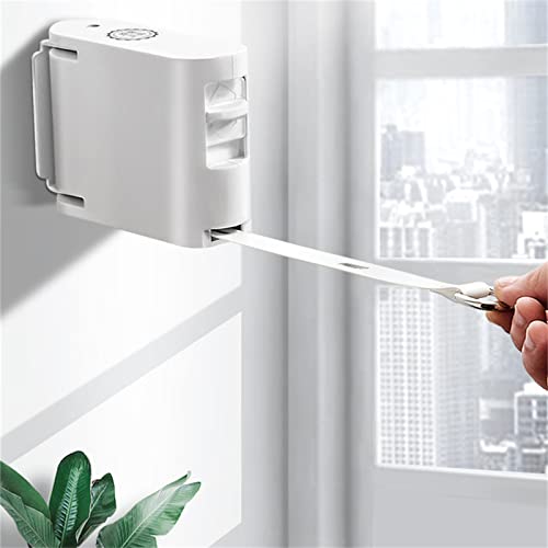 Corde à linge rétractable pour optimiser l'espace et simplifier la lessive - 7