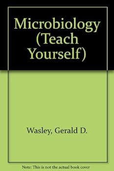 Paperback Microbiology Teach Yourself Book