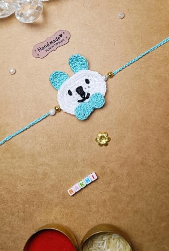 Image of Designer Bunny Bear Crochet Rakhi Made With Soft Cotton Thread | Bunny Bear Rakhi For Kids
