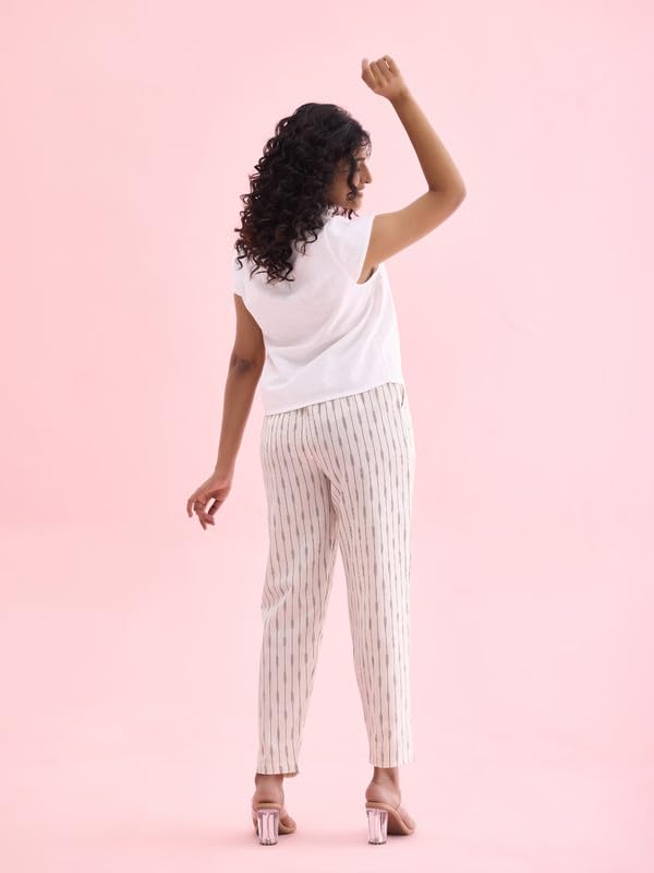 Image of GO COLORS Ikat Print Beige Printed Pencil Pant for Women | Breathable, Side Pocket
