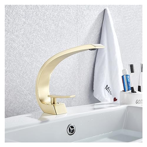Robinet lavabo or brossé pour une salle de bains moderne